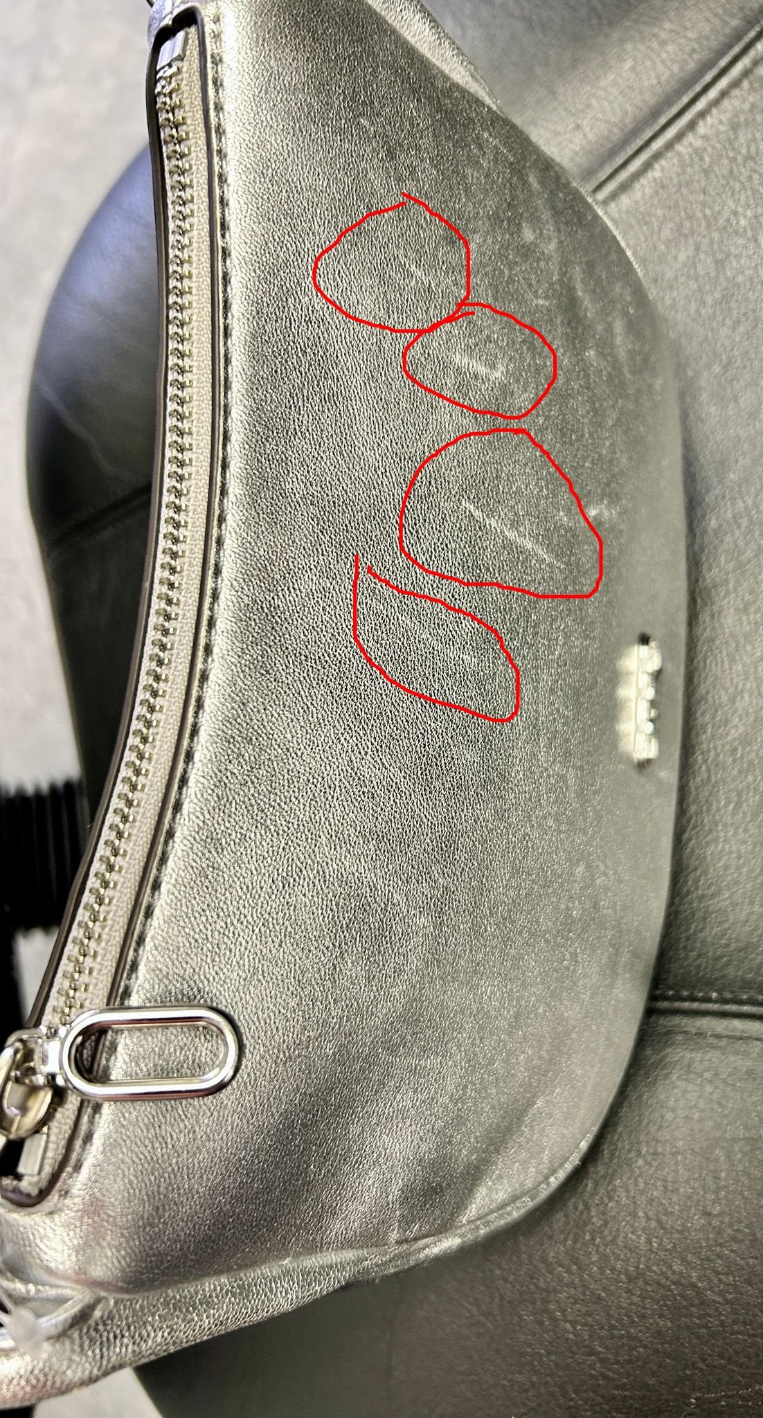 Light leather damage due to handling.