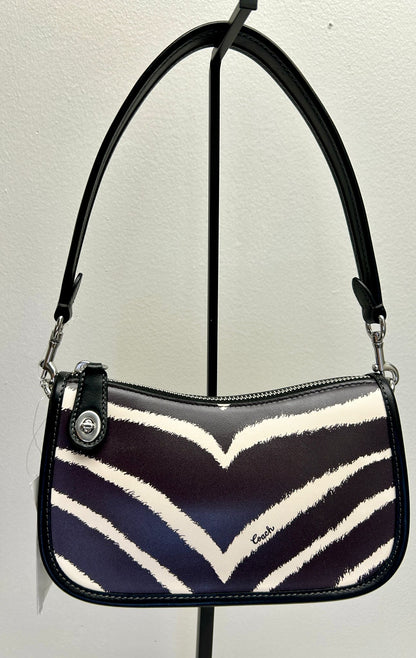 Bolso Coach Swinger 20 con estampado de cebra